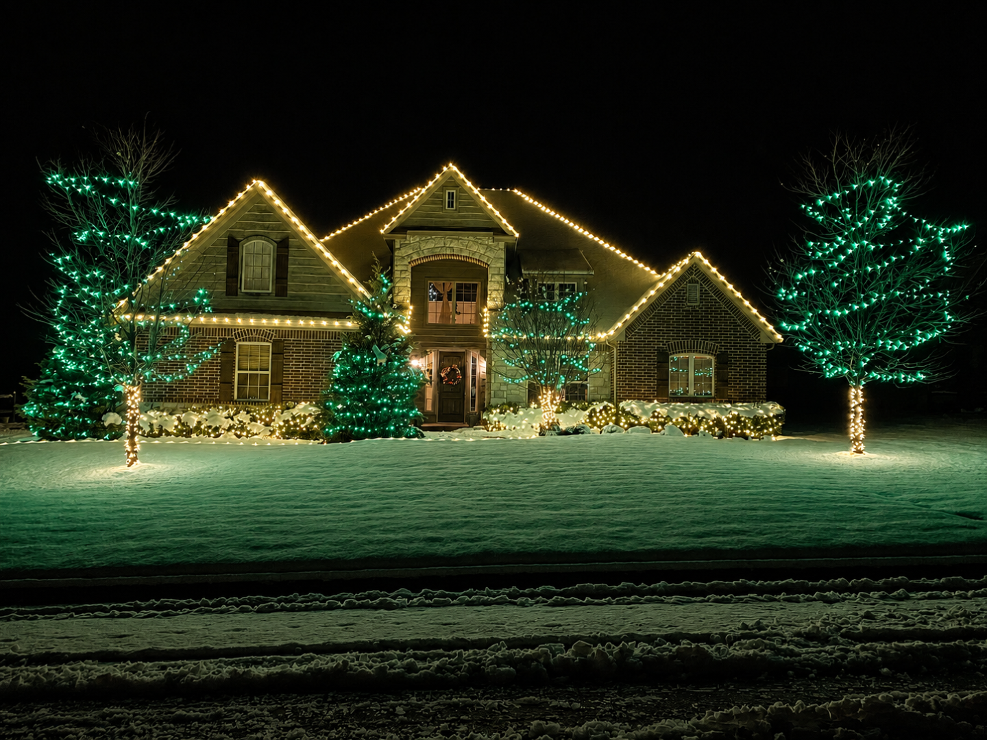 A home decorated with holiday lights